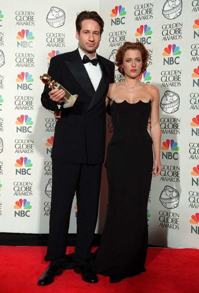 The X-Files stars David Duchovny and Gillian Anderson at the Golden Globe Awards where their show won Best TV Drama Series Featureflash / Shutterstock.com