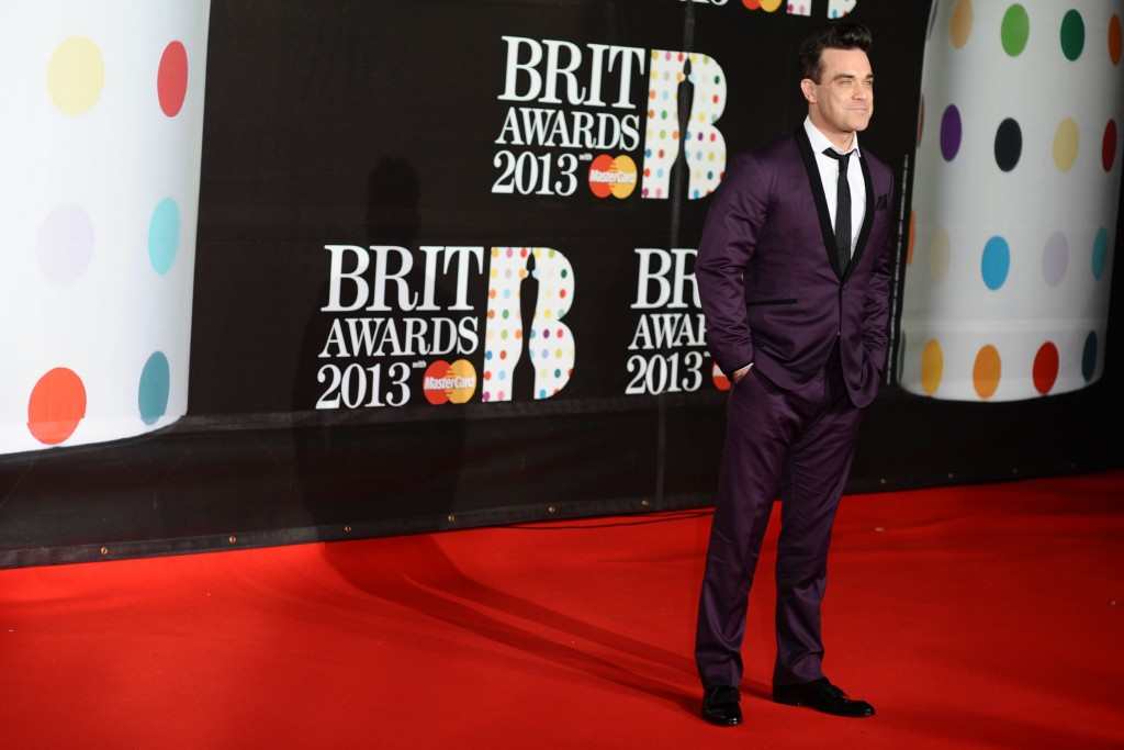 Robbie Williams arrives for the Brit Awards 