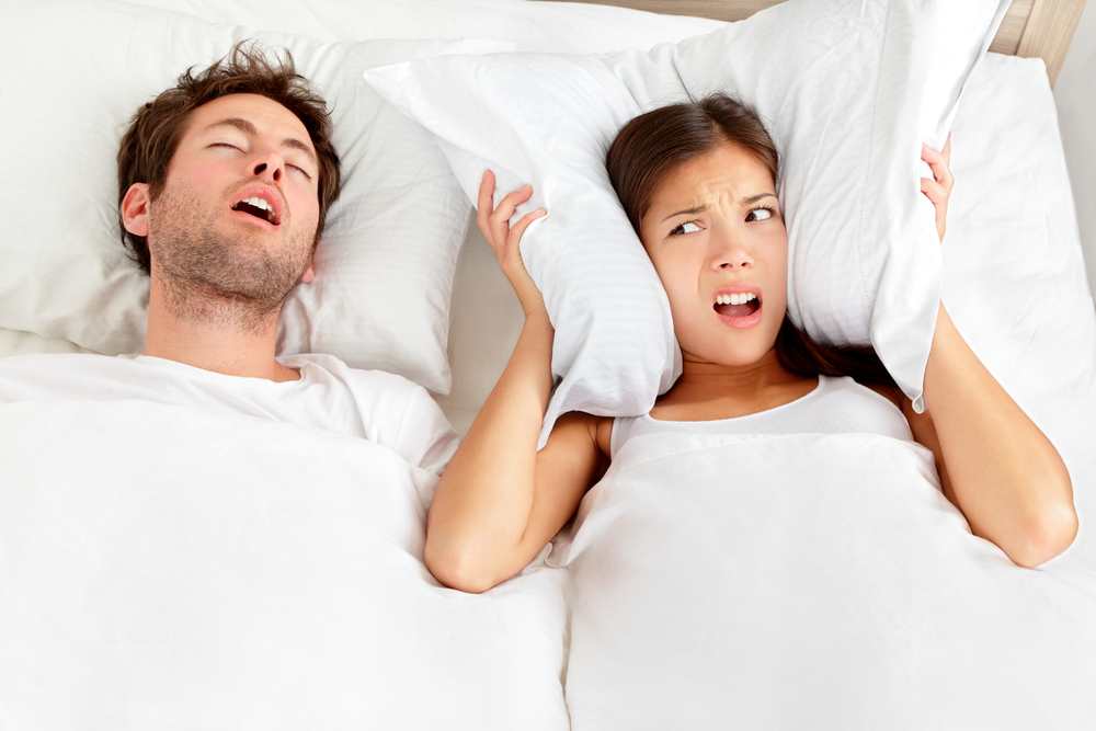 Is your partner's snoring keeping you awake? Here's how to solve it TheFuss.co.uk
